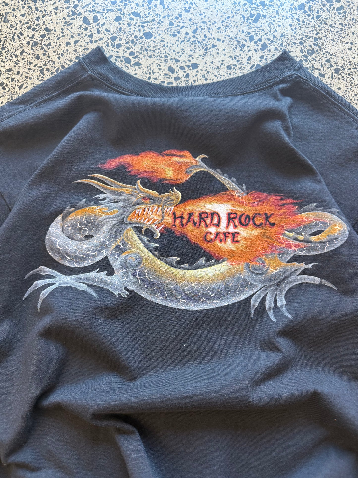 Vintage Y2K Hard Rock Café t-shirt with dragon flame back graphic, black, size M.