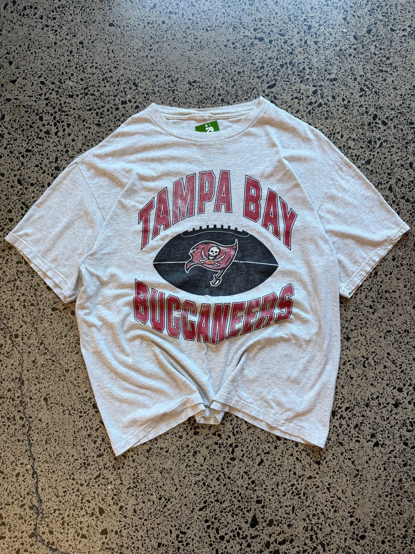 Vintage 1997 Tampa Bay Buccaneers red t-shirt with helmet and team graphic. Size L. NFL football memorabilia.