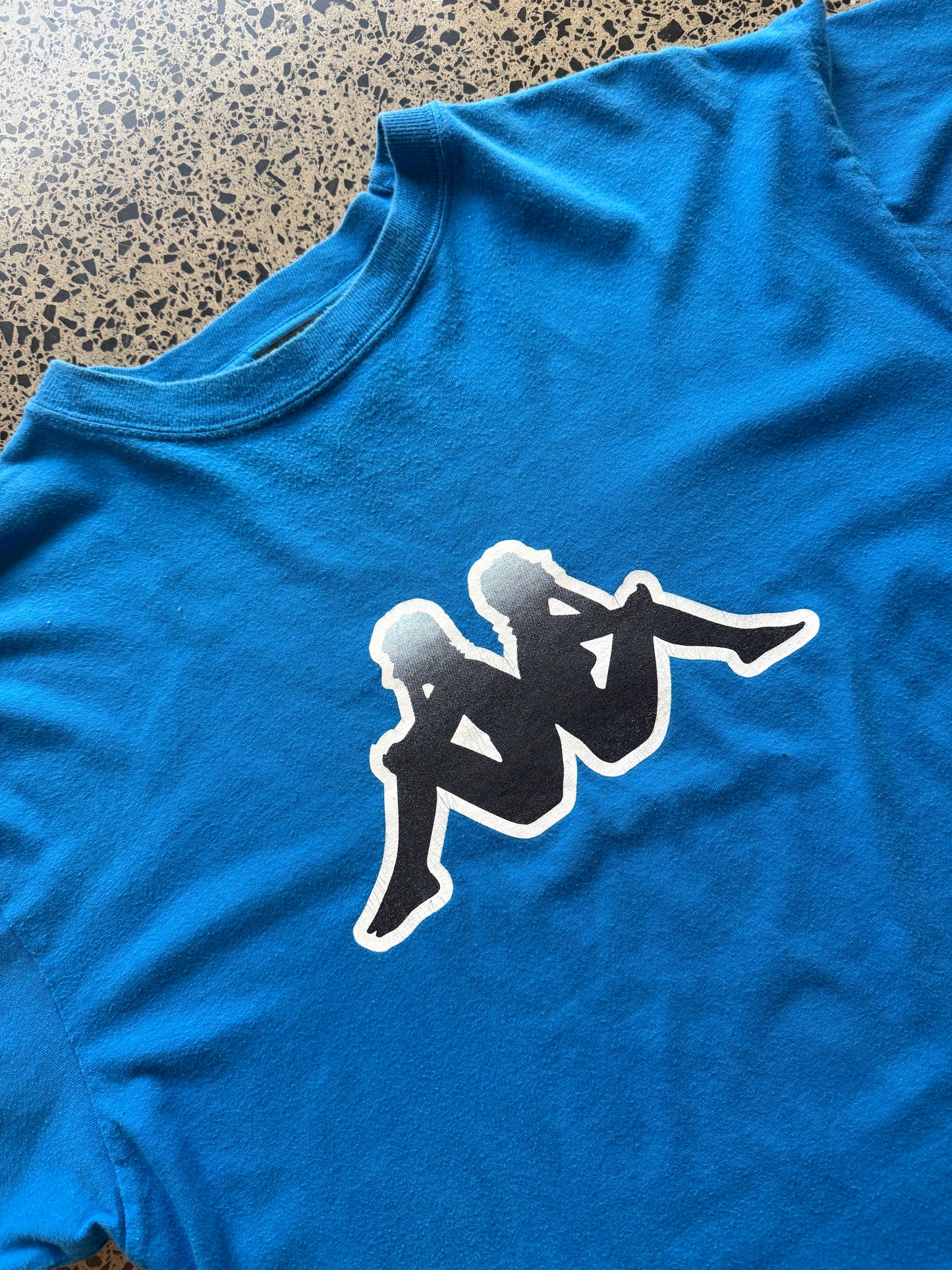 Blue Kappa t-shirt with large white logo graphic on front, size L, laid flat on white background