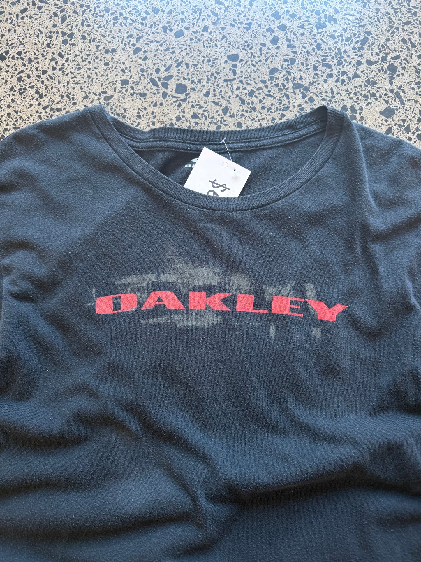 Vintage Oakley black long sleeve t-shirt with bold white sleeve and chest logos. Size XL. Skate & Y2K streetwear