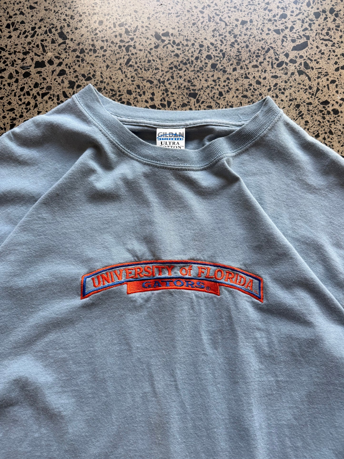 Vintage blue University of Florida Gators t-shirt with bold graphic, size L, laid flat on white background