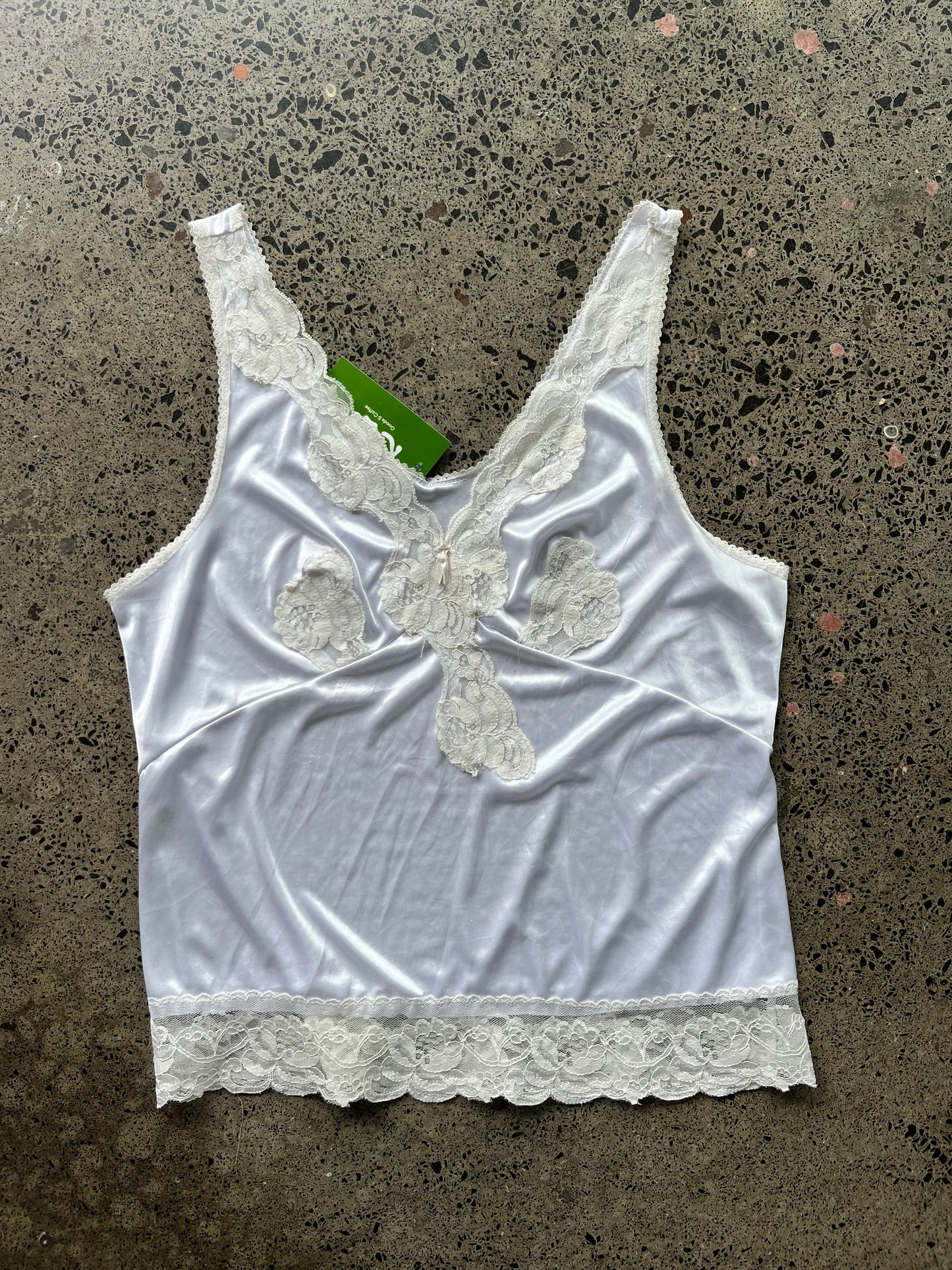 Light baby blue camisole top with delicate white floral pattern, size XL, made from lightweight breathable fabric with adjustable straps for a comfortable fit." baby blue floral cami XL
light blue camisole with white flowers
women's floral cami extra large
breathable floral cami top
adjustable strap cami XL
soft baby blue camisole
large size floral cami top
delicate white flower print cami
spring summer camisole
feminine floral cami XL