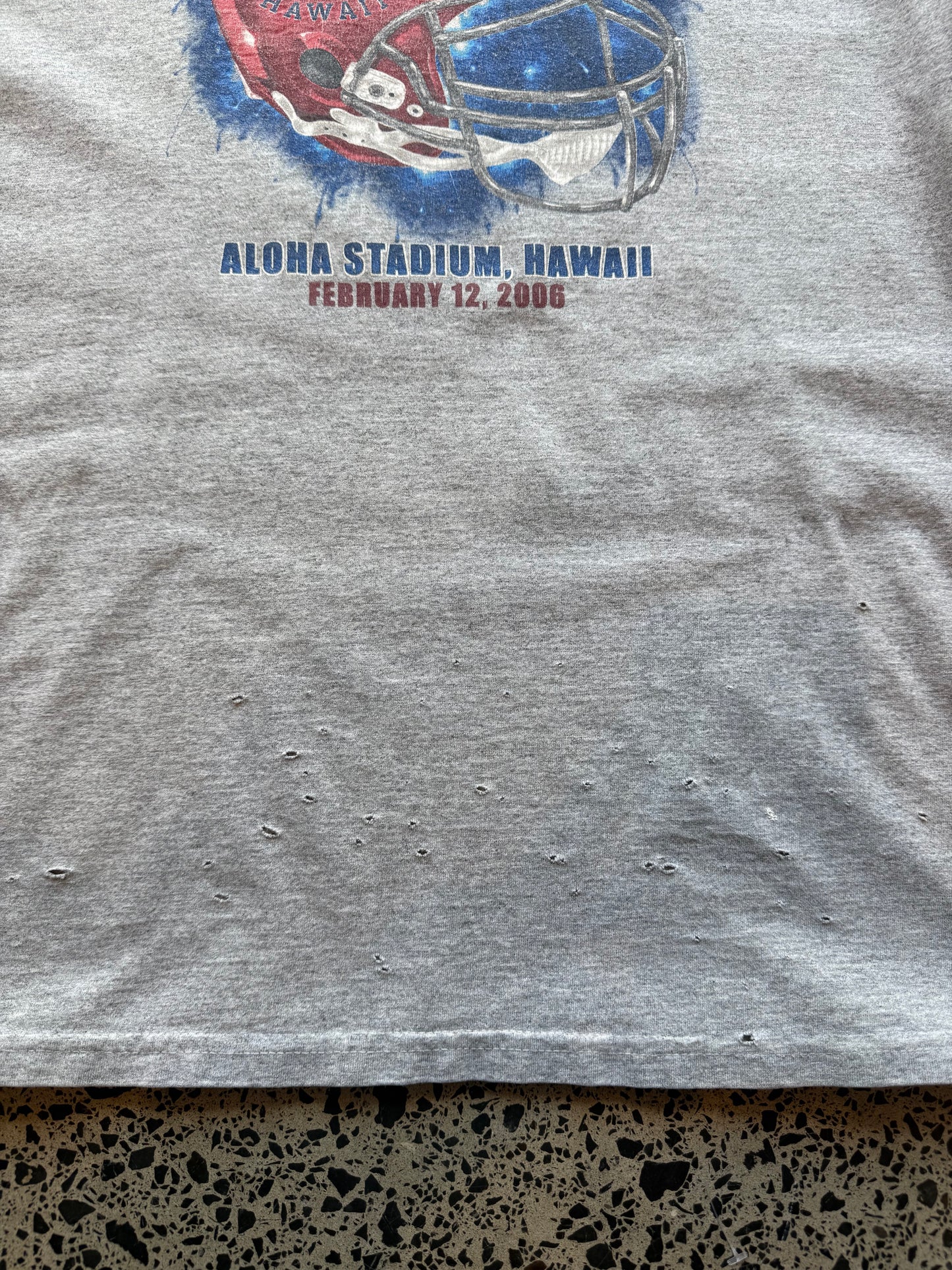 2006 Pro Bowl NFL T-shirt, size XL, laid on polished concrete background — bold mid-2000s football graphic on soft cotton.
