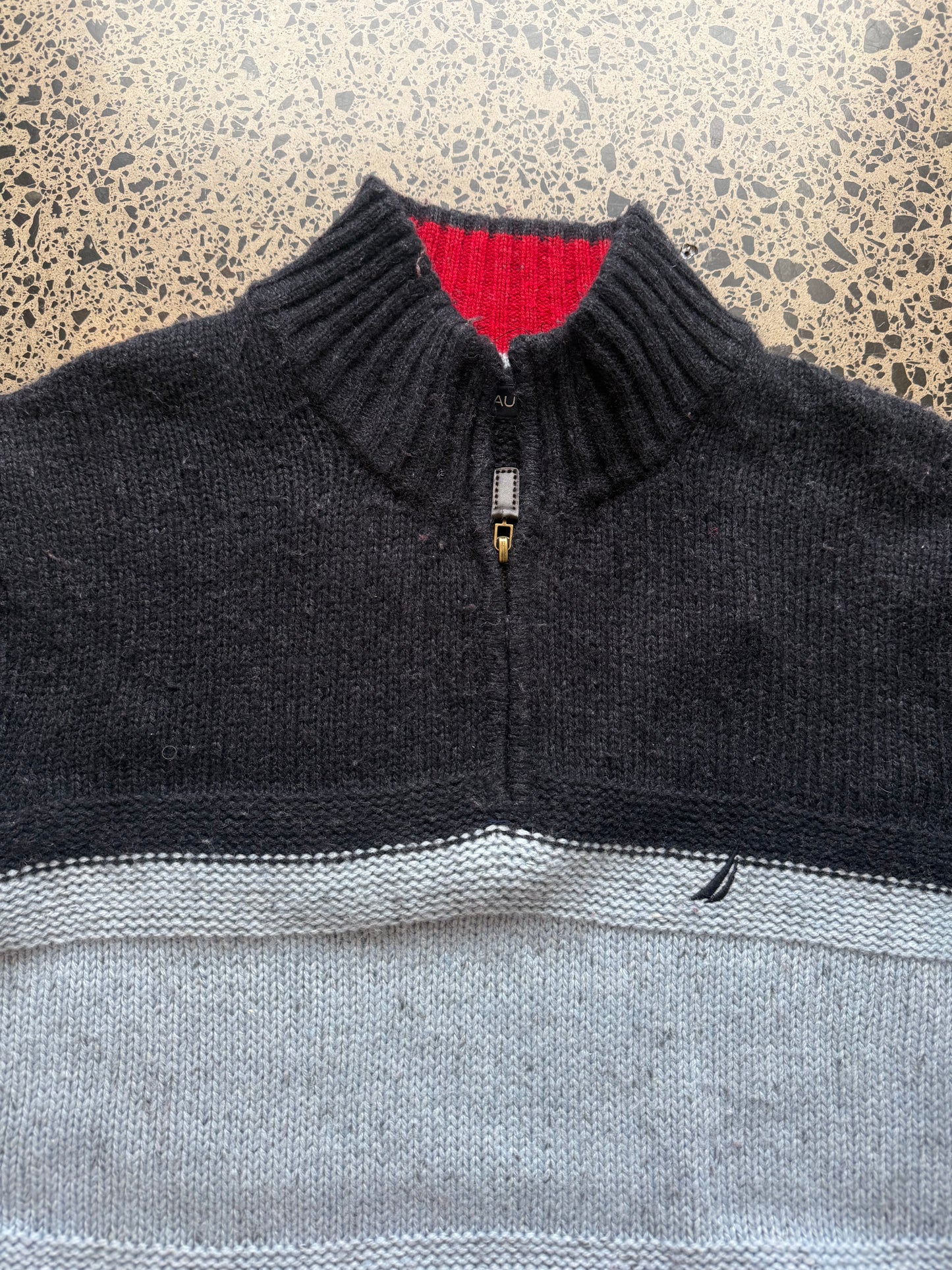 Nautica 1/4 zip knit jumper XL laid flat on polished concrete background, vintage knit sweater with quarter zip collar and relaxed fit.