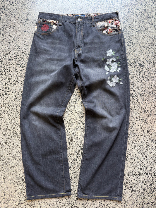 Karakuri embroidered denim jeans with koi fish, floral and wave designs. W37 L30. Japanese-inspired vintage Y2K denim