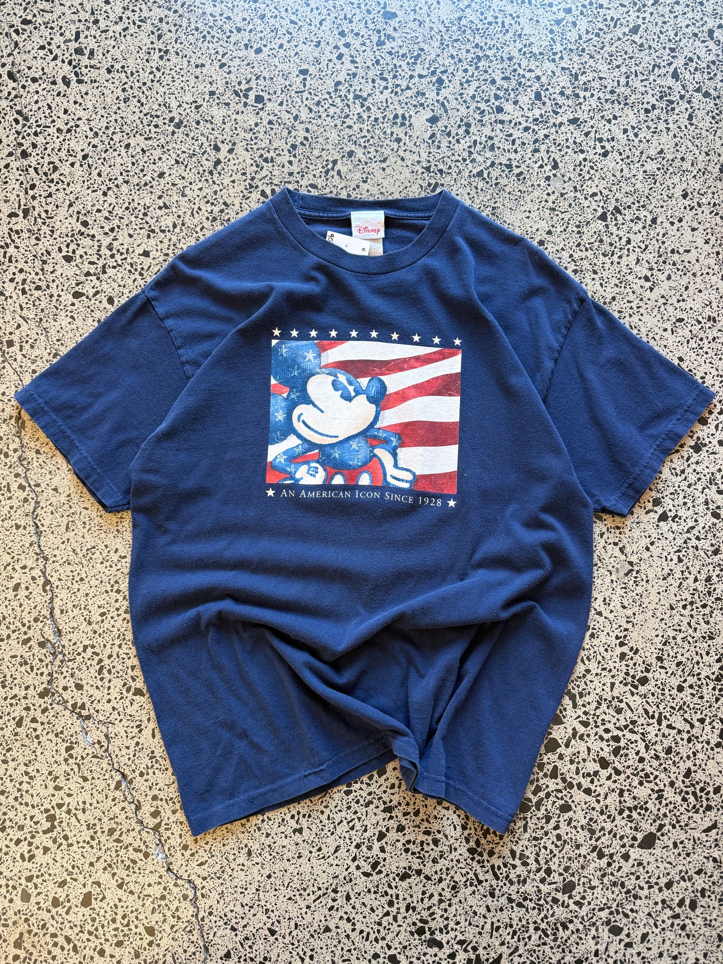 Vintage 90s Disney Mickey Mouse t-shirt with bold, colourful front graphic. Size L. Nostalgic and playful.