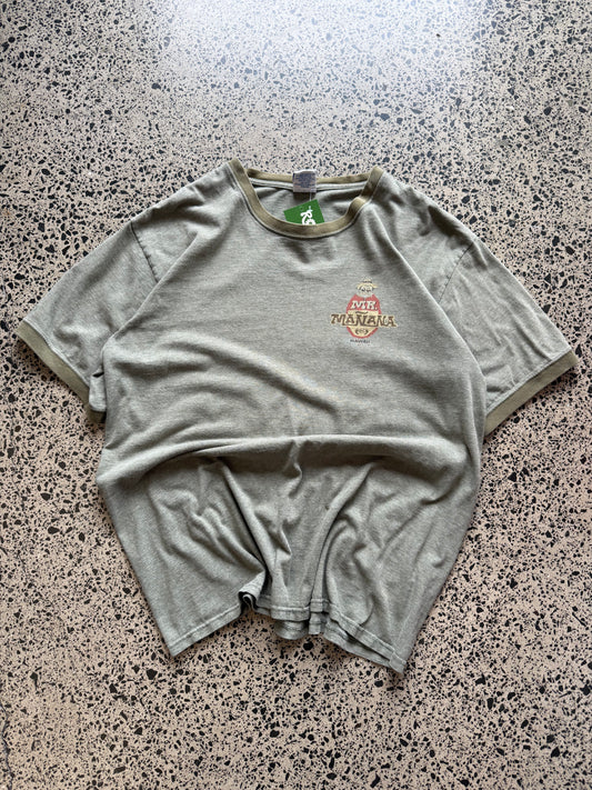 2001 Mr. Mañana graphic T-shirt, size L, laid on polished concrete background — bold early-2000s front print on soft cotton.