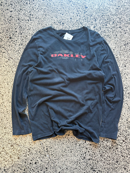 Vintage Oakley black long sleeve t-shirt with bold white sleeve and chest logos. Size XL. Skate & Y2K streetwear