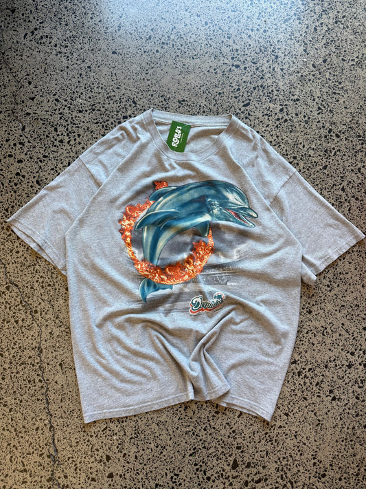 Grey 2001 Miami Dolphins NFL graphic t-shirt with teal and orange print, size XL, laid flat on a polished concrete background