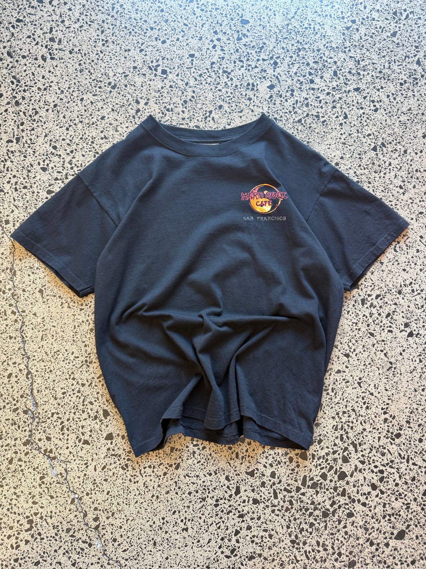 Vintage Y2K Hard Rock Café t-shirt with dragon flame back graphic, black, size M.