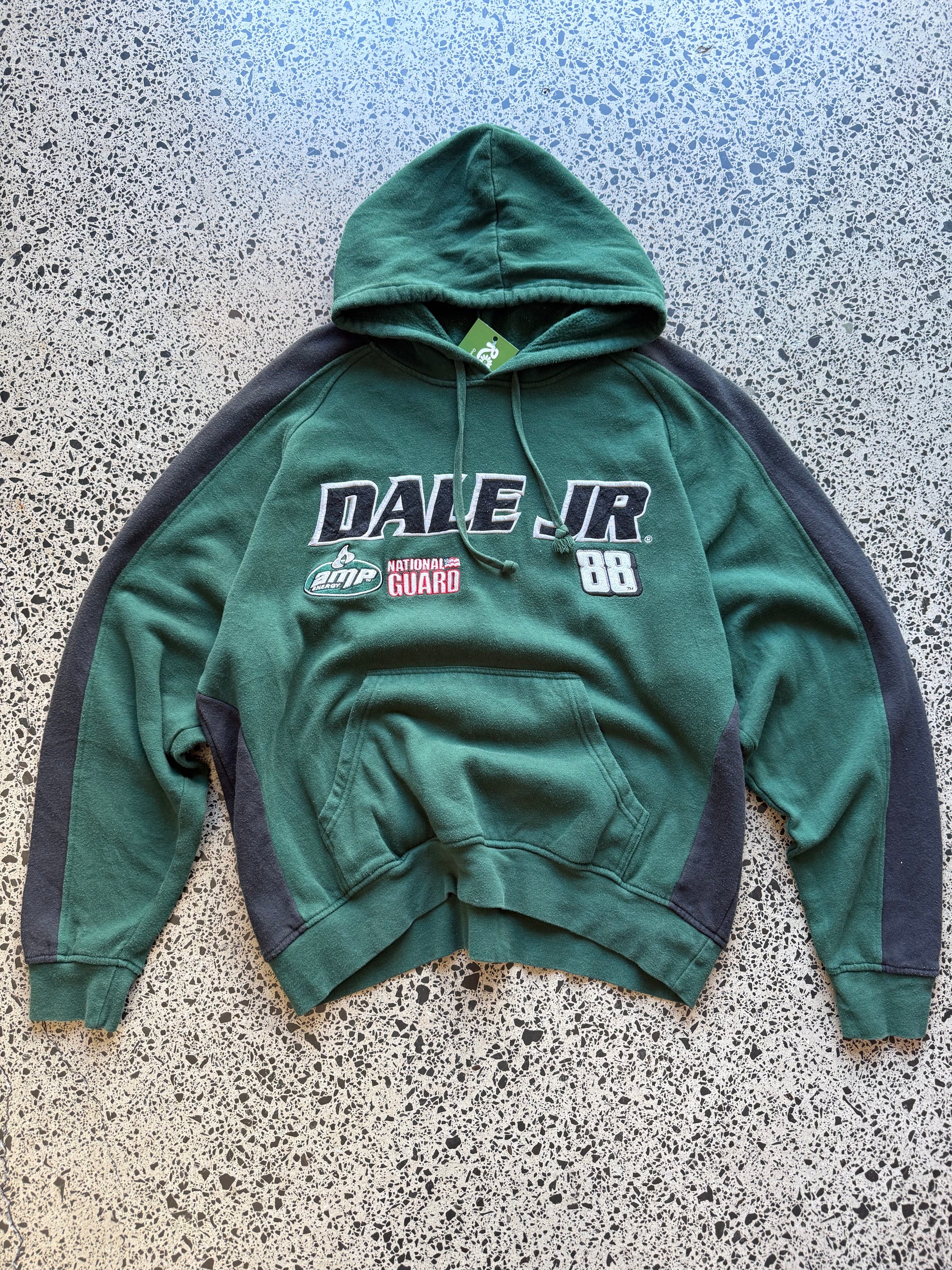 2008 NASCAR Dale Jr number 88 two-tone hoodie XL laid flat on polished concrete background, vintage racing hoodie with bold graphics and colour block design.