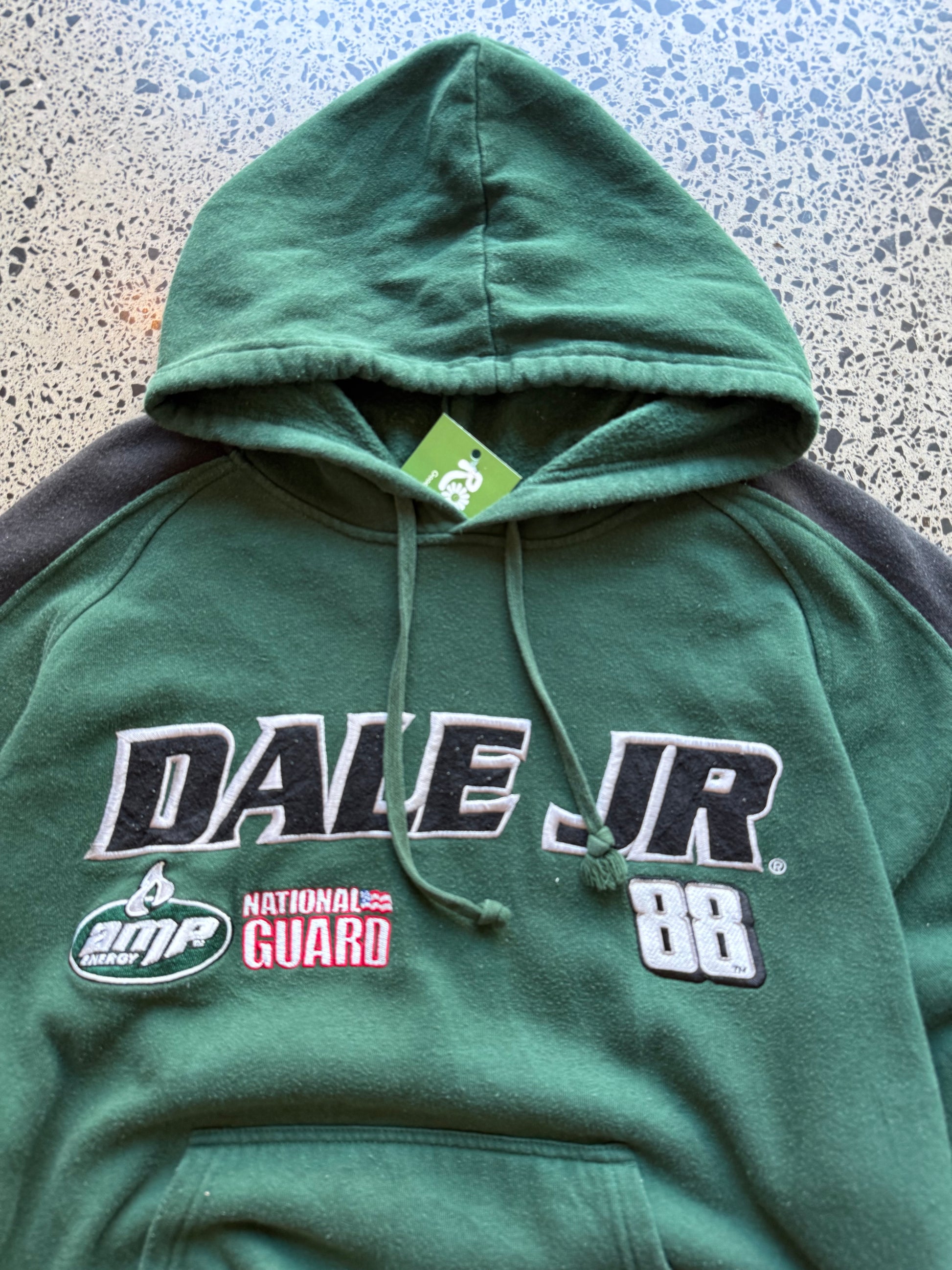 2008 NASCAR Dale Jr number 88 two-tone hoodie XL laid flat on polished concrete background, vintage racing hoodie with bold graphics and colour block design.