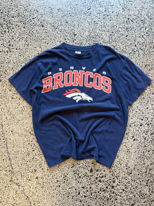 Vintage 90s NFL Denver Broncos navy t-shirt with bold orange and blue team graphic. Size XL. Football memorabilia