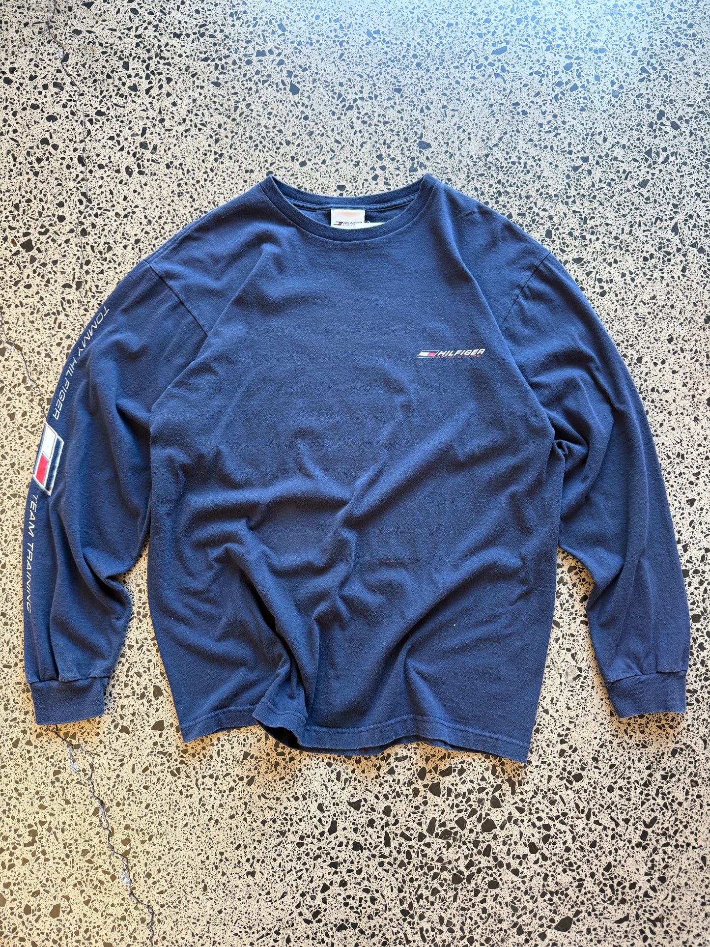 Vintage 90s Tommy Hilfiger navy long sleeve shirt with embroidered flag logo. Size M. American streetwear and preppy vintage