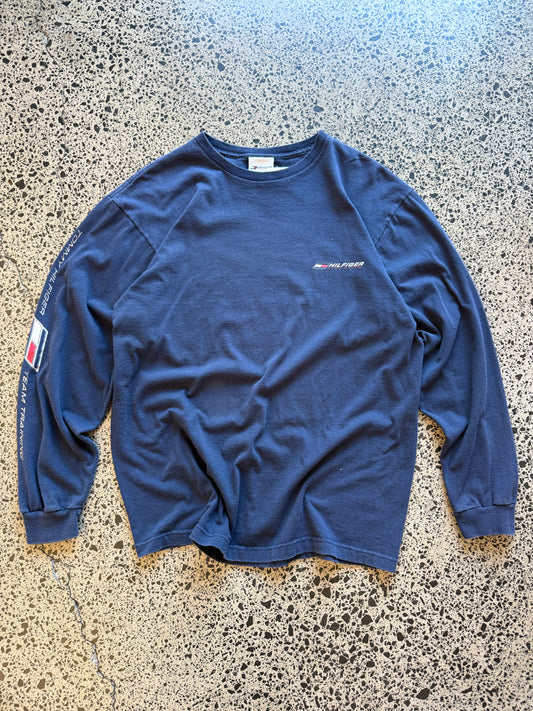 Vintage 90s Tommy Hilfiger navy long sleeve shirt with embroidered flag logo. Size M. American streetwear and preppy vintage