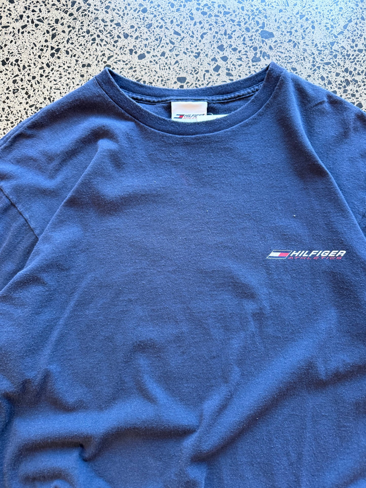 Vintage 90s Tommy Hilfiger navy long sleeve shirt with embroidered flag logo. Size M. American streetwear and preppy vintage