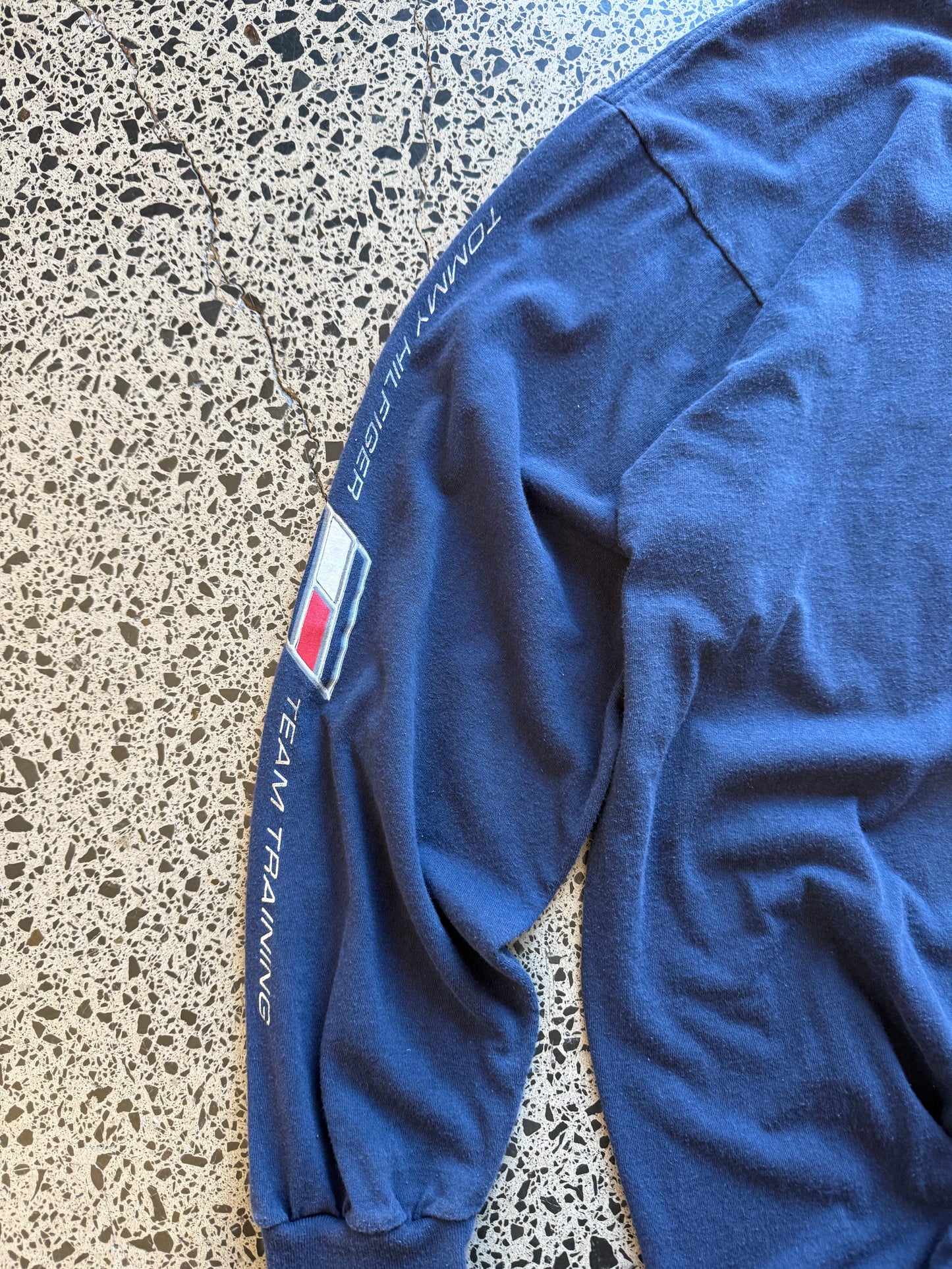 Vintage 90s Tommy Hilfiger navy long sleeve shirt with embroidered flag logo. Size M. American streetwear and preppy vintage
