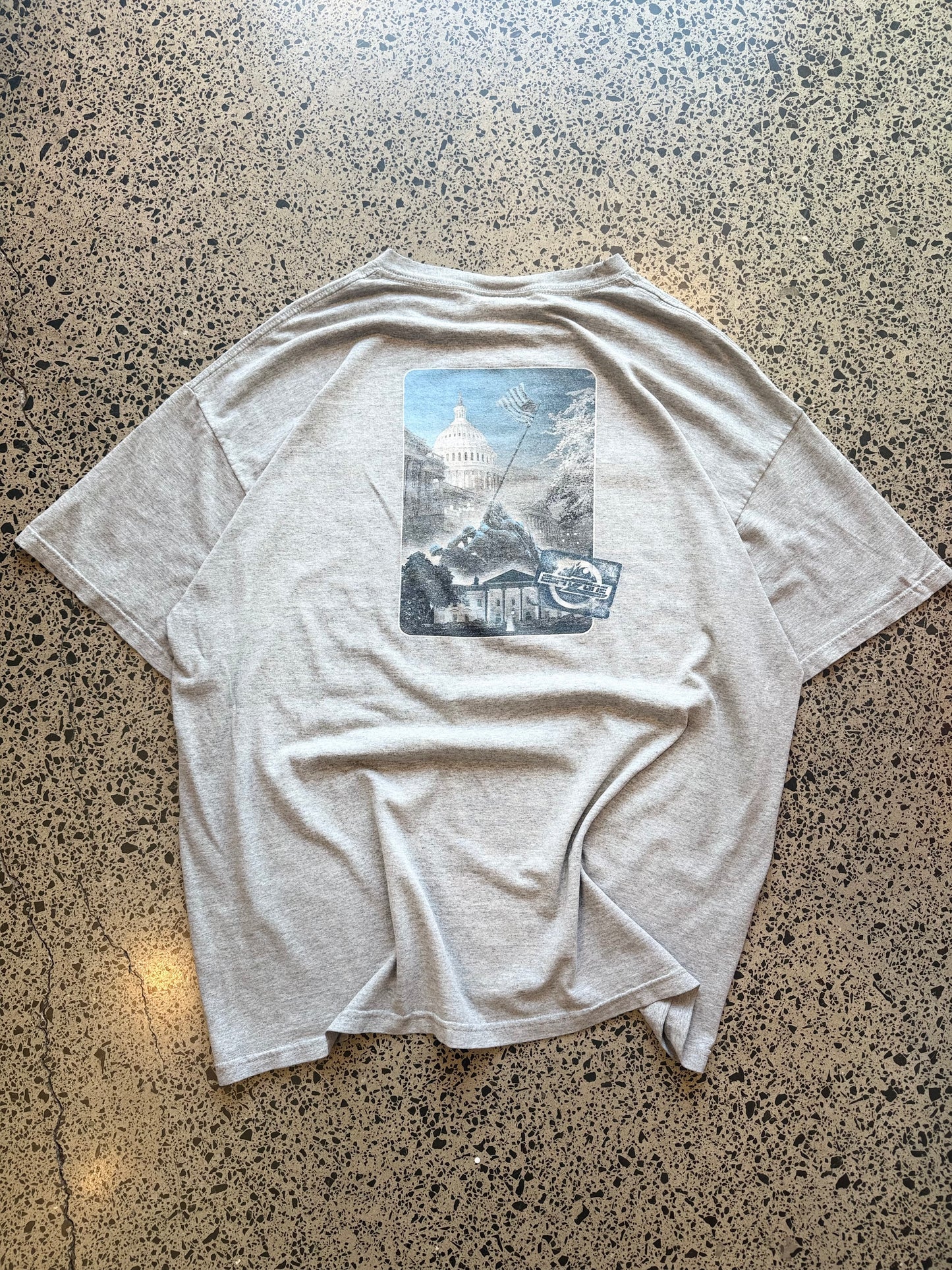 2000s ESPN graphic T-shirt, size XL, laid on polished concrete background — bold vintage ESPN logo on soft cotton.