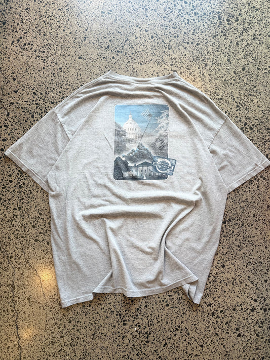 2000s ESPN graphic T-shirt, size XL, laid on polished concrete background — bold vintage ESPN logo on soft cotton.