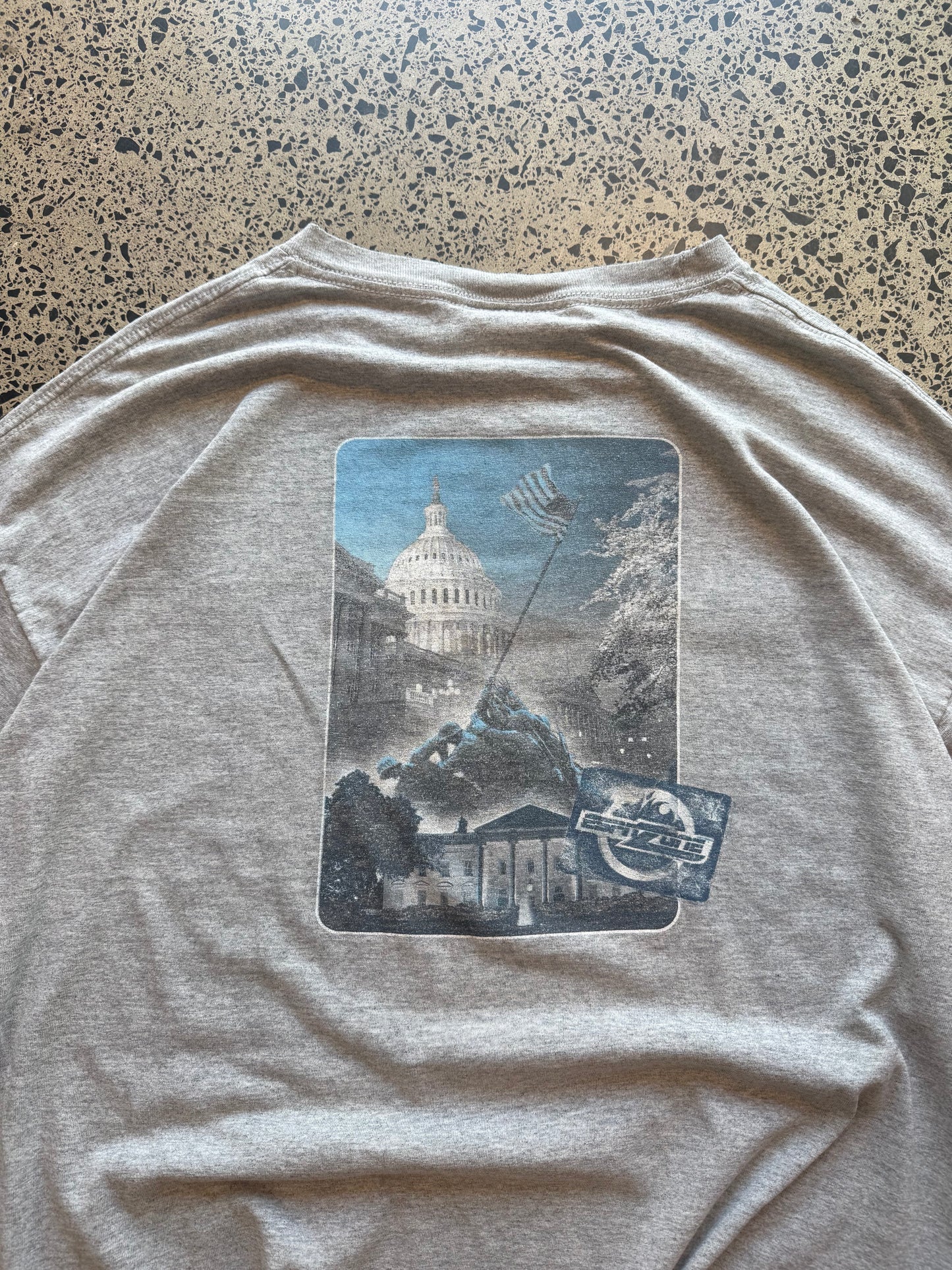 2000s ESPN graphic T-shirt, size XL, laid on polished concrete background — bold vintage ESPN logo on soft cotton.