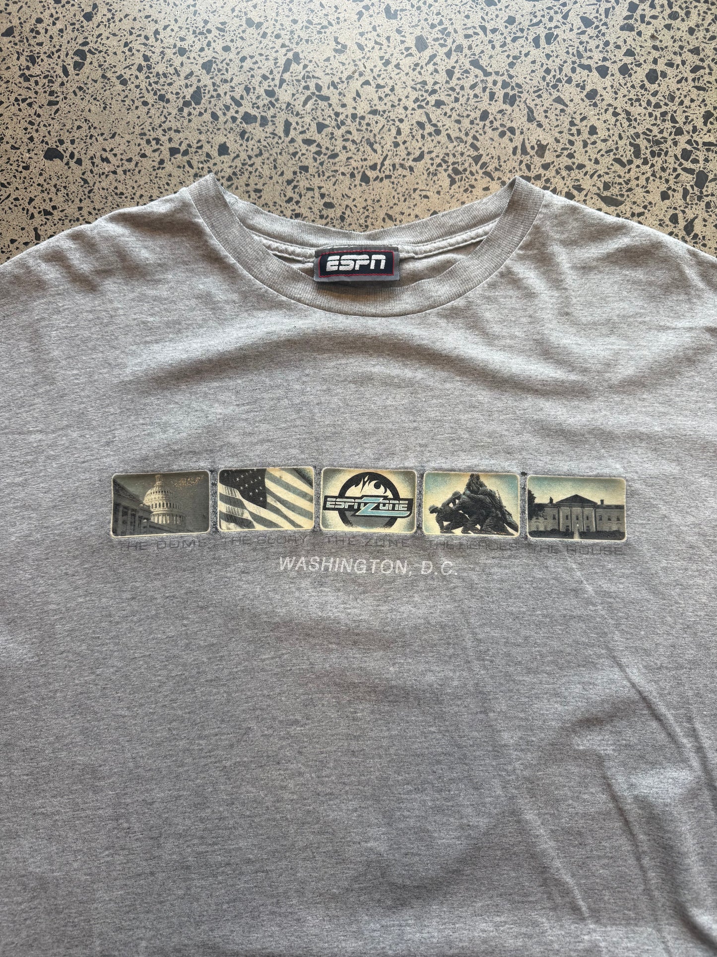 2000s ESPN graphic T-shirt, size XL, laid on polished concrete background — bold vintage ESPN logo on soft cotton.
