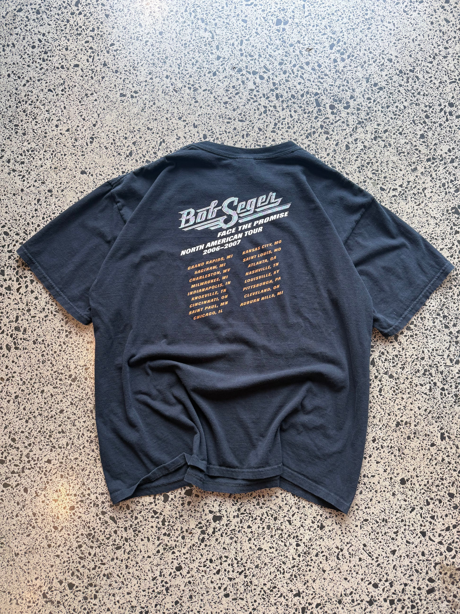 2006/07 Bob Seger North America tour t-shirt size 2XL laid flat on polished concrete background, vintage band tee with tour graphics and relaxed oversized fit.