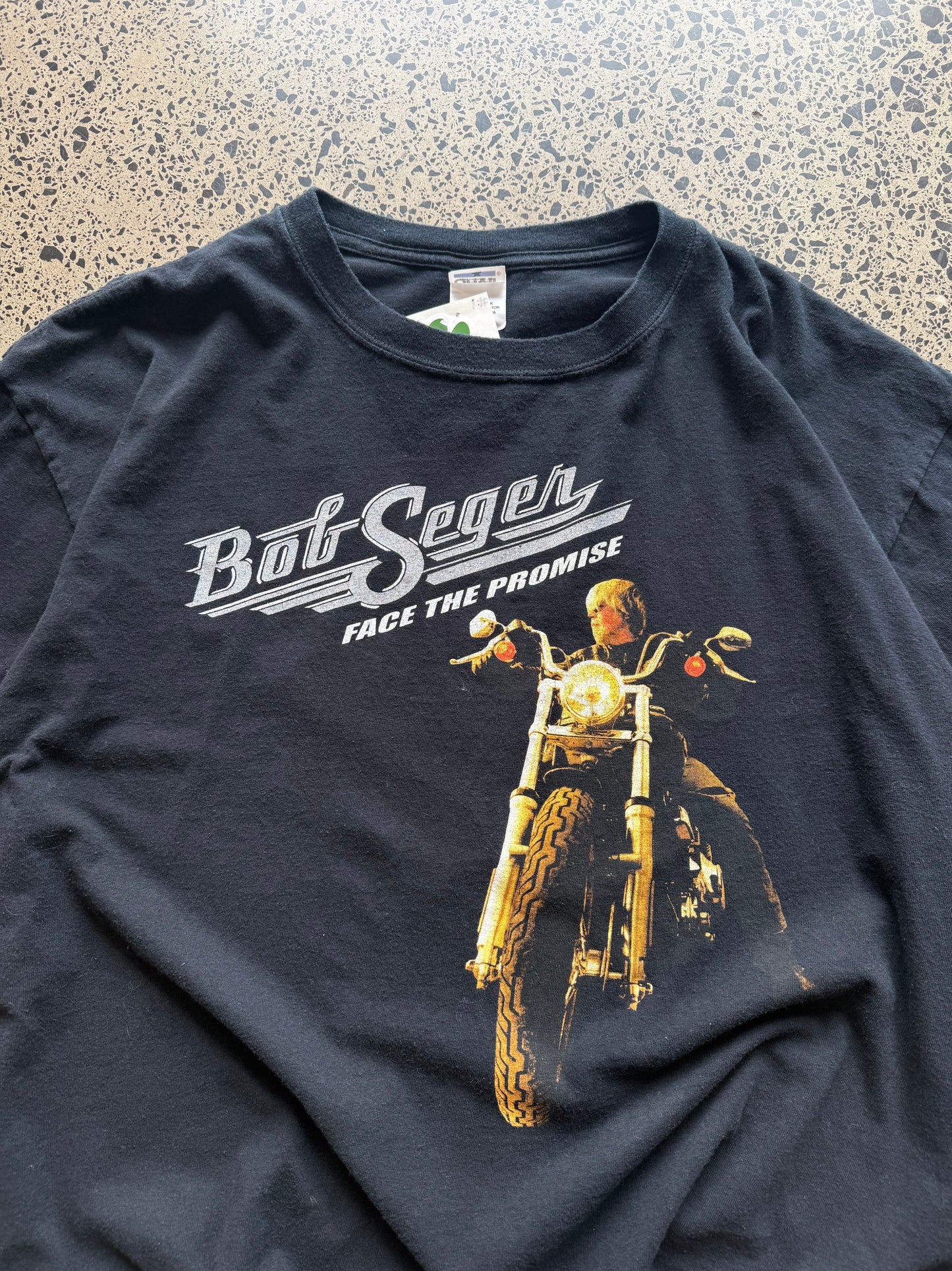 2006/07 Bob Seger North America tour t-shirt size 2XL laid flat on polished concrete background, vintage band tee with tour graphics and relaxed oversized fit.