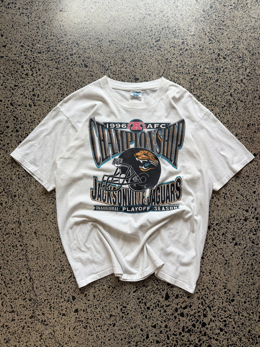 90s Jacksonville Jaguars NFL vintage t-shirt in faded black with bold championship graphic. Size XL.