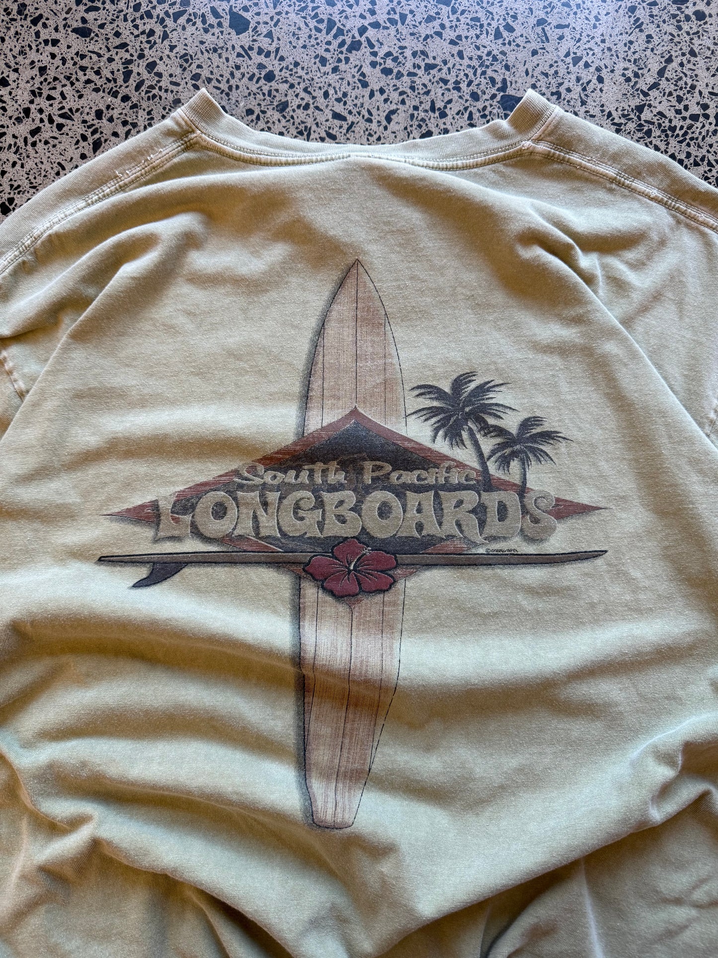 Y2K South Pacific Longboards navy t-shirt with tropical surf graphics front and back. Size XL. Vintage surf shop tee