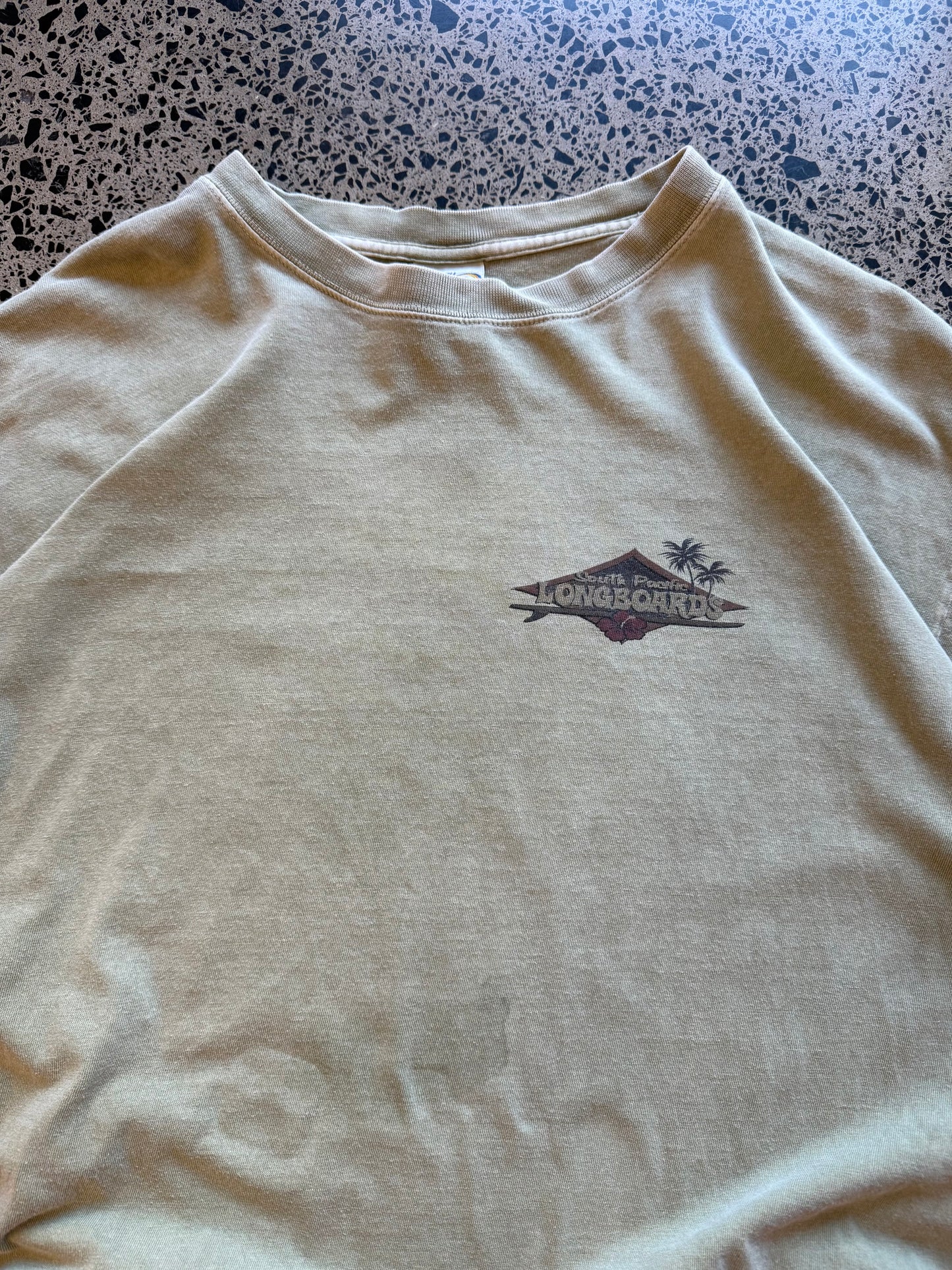 Y2K South Pacific Longboards navy t-shirt with tropical surf graphics front and back. Size XL. Vintage surf shop tee