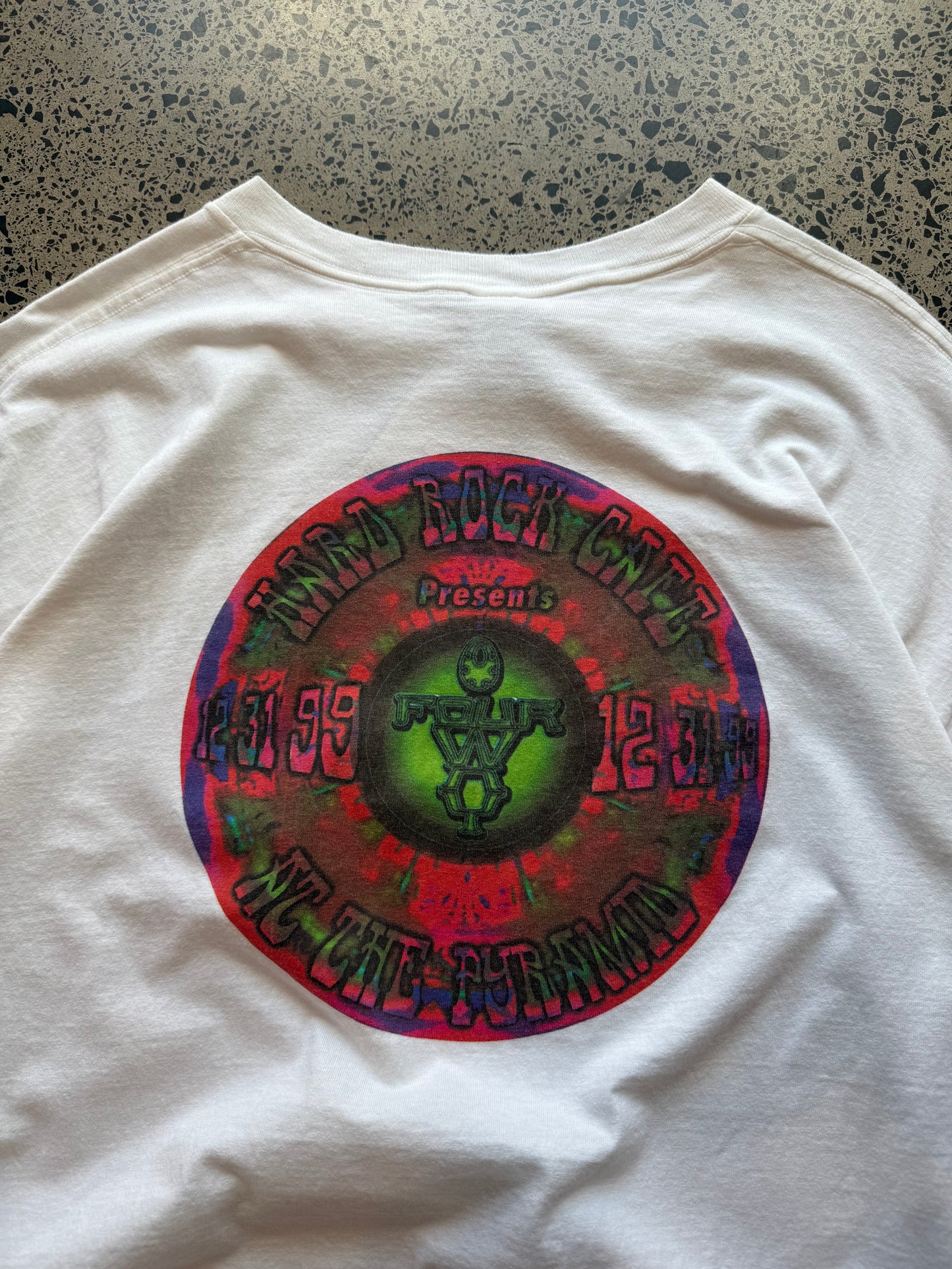 90s Myrtle Beach Hard Rock T-shirt, size XL, laid on polished concrete background vintage Hard Rock logo on soft 90s cotton.