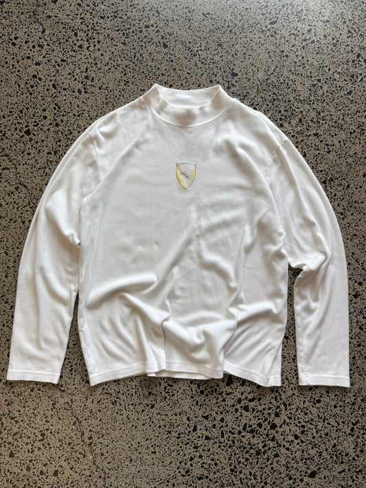 Official vintage Ferrari long sleeve t-shirt in black with front logo and sleeve print. Size XL
