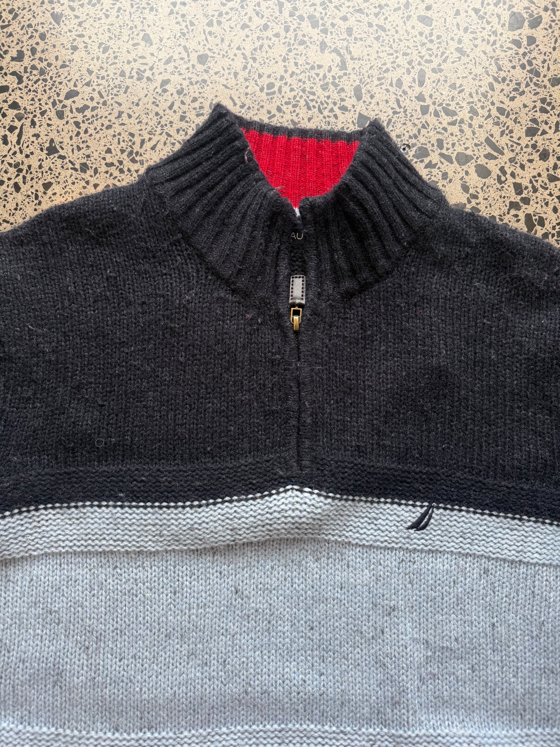 Nautica 1/4 zip knit jumper XL laid flat on polished concrete background, vintage knit sweater with quarter zip collar and relaxed fit.