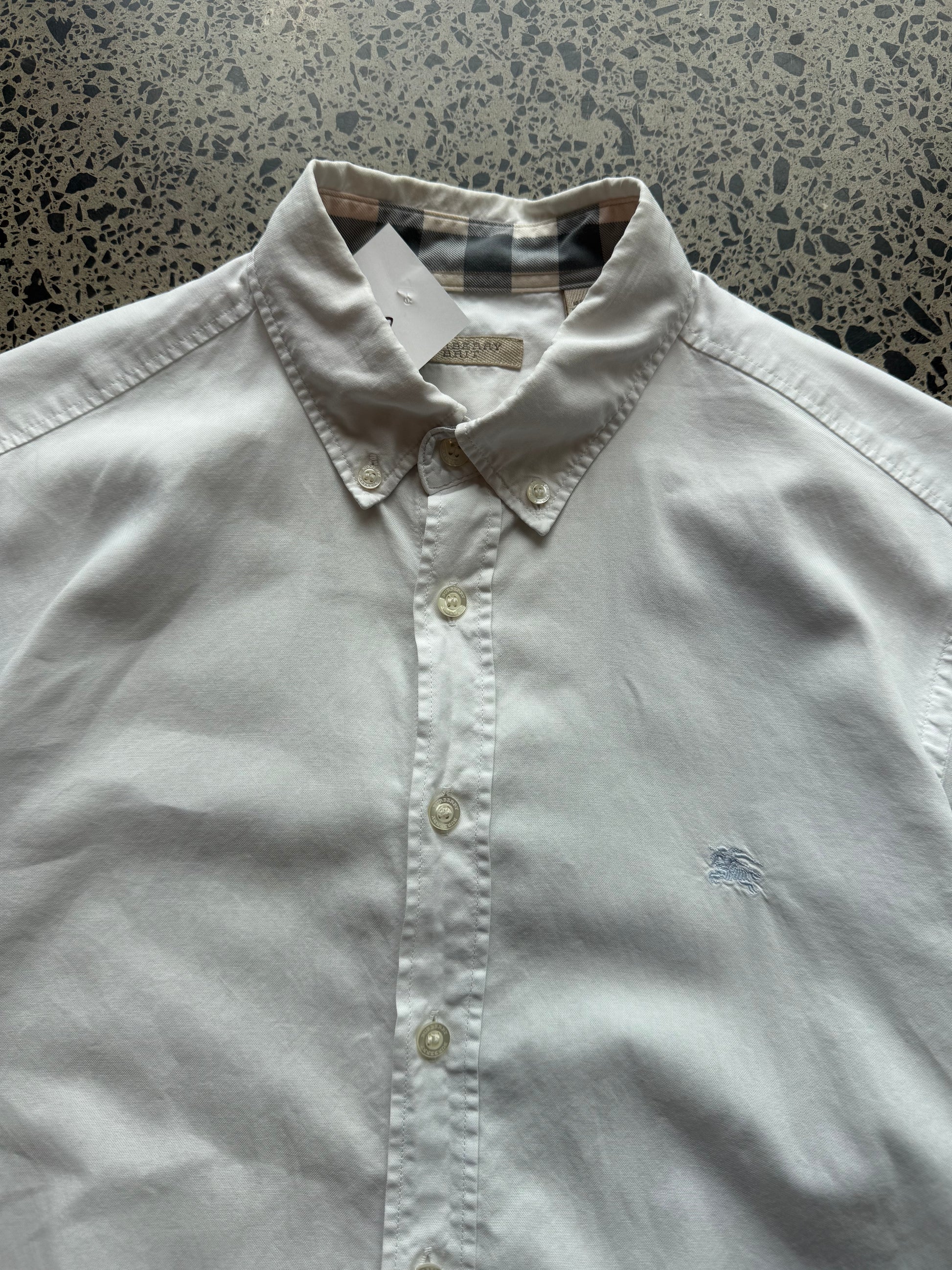 White Burberry white striped button-up shirt in size L. 