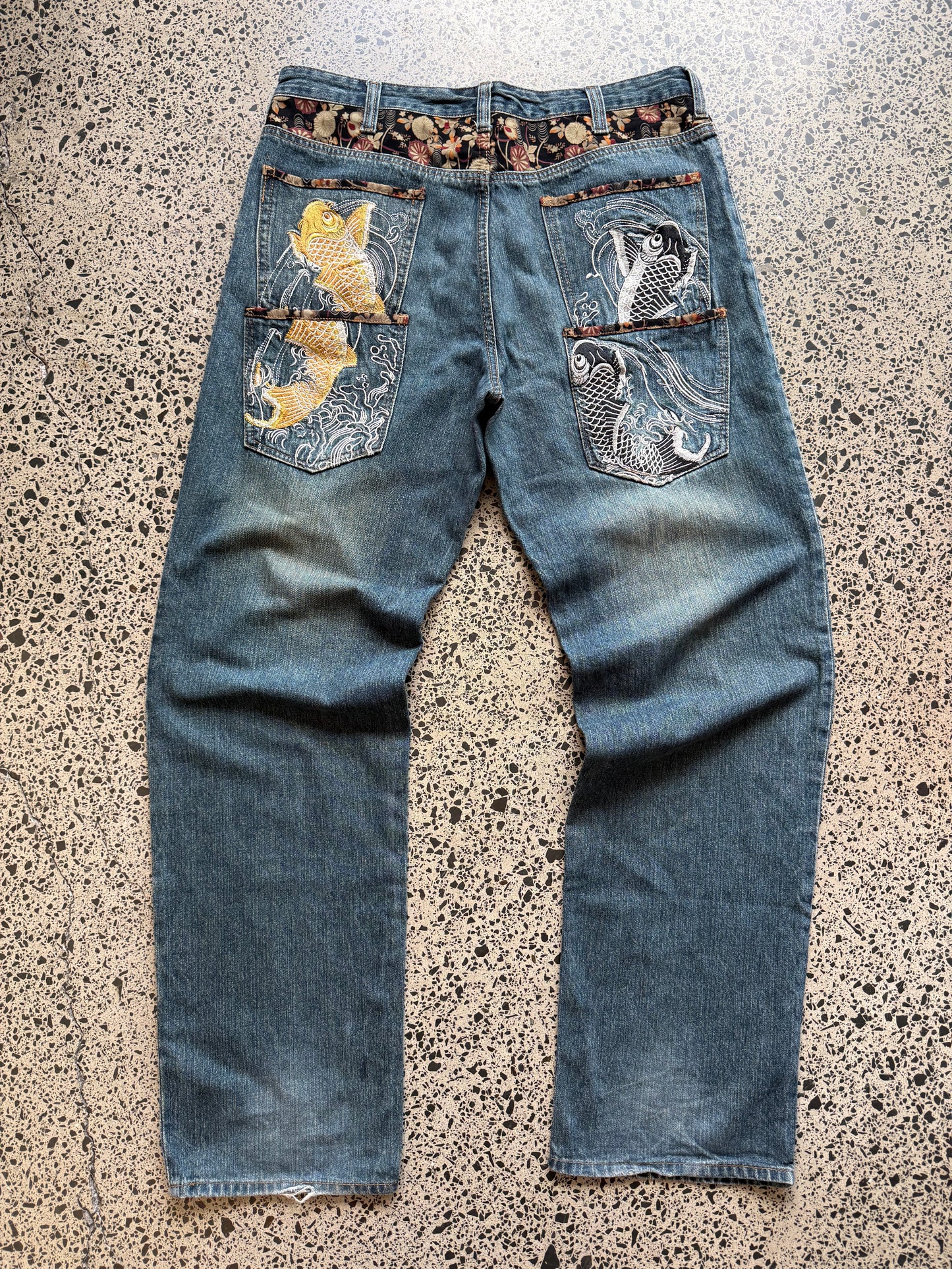 Dominate handcrafted embroidered denim jeans with koi fish, waves, and sakura design. W36 L33 vintage streetwear