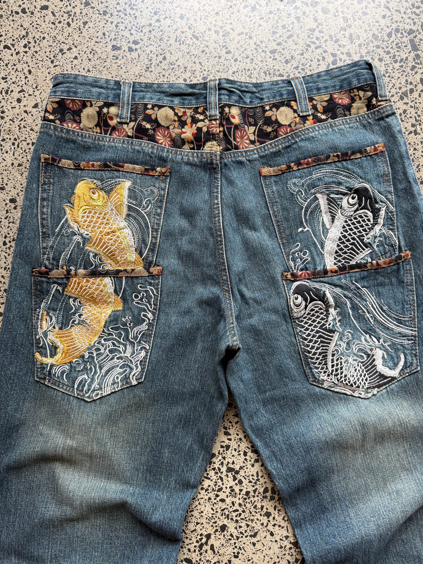 Dominate handcrafted embroidered denim jeans with koi fish, waves, and sakura design. W36 L33 vintage streetwear