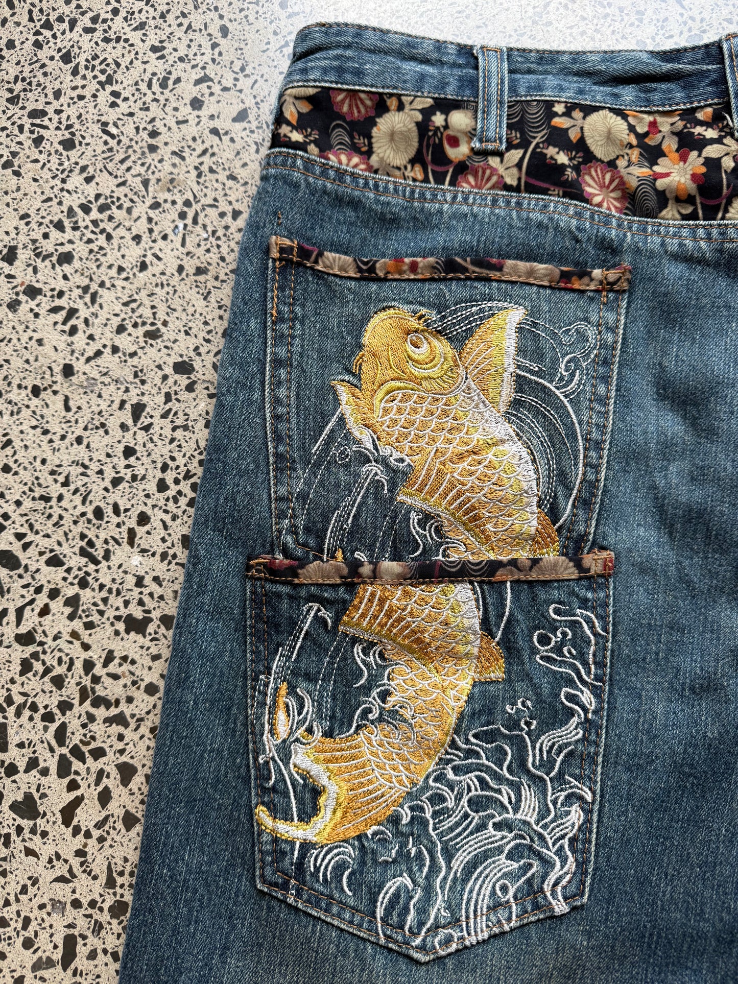 Dominate handcrafted embroidered denim jeans with koi fish, waves, and sakura design. W36 L33 vintage streetwear