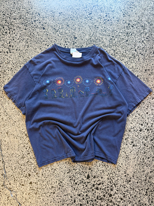 Vintage Y2K Peanuts black t-shirt featuring bold, colourful Snoopy and friends graphic. Size XL. Nostalgic comic strip tee