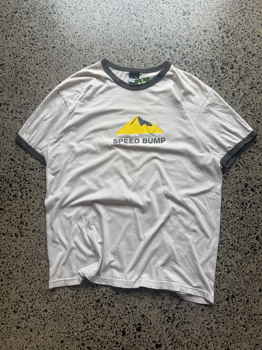 1994 Nike Black Label t-shirt size XL laid flat on polished concrete background, vintage Nike tee with classic branding and relaxed fit.