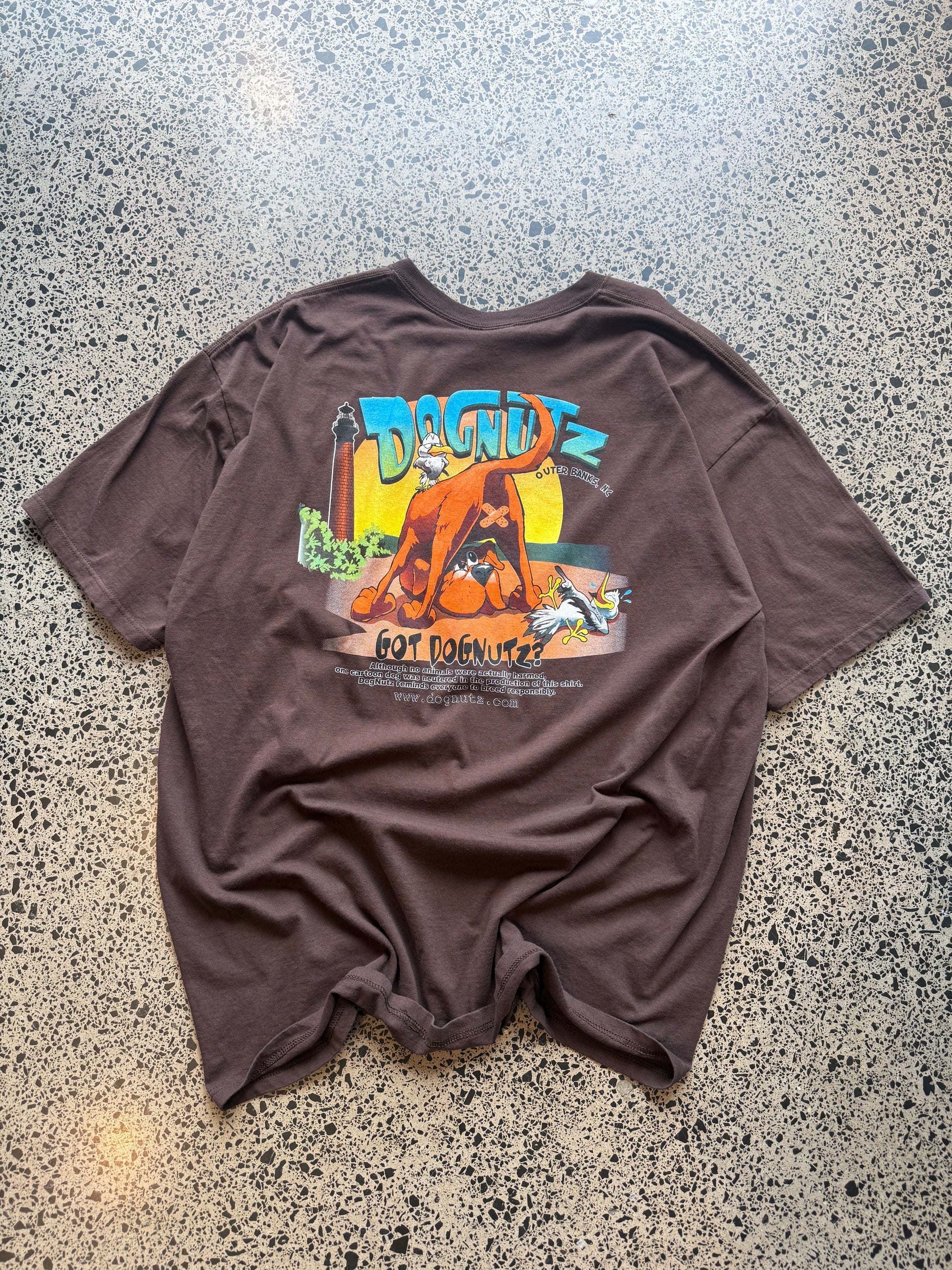 Cop this Dognutz, Outer Banks CA graphic tee on a brown base - 3XL