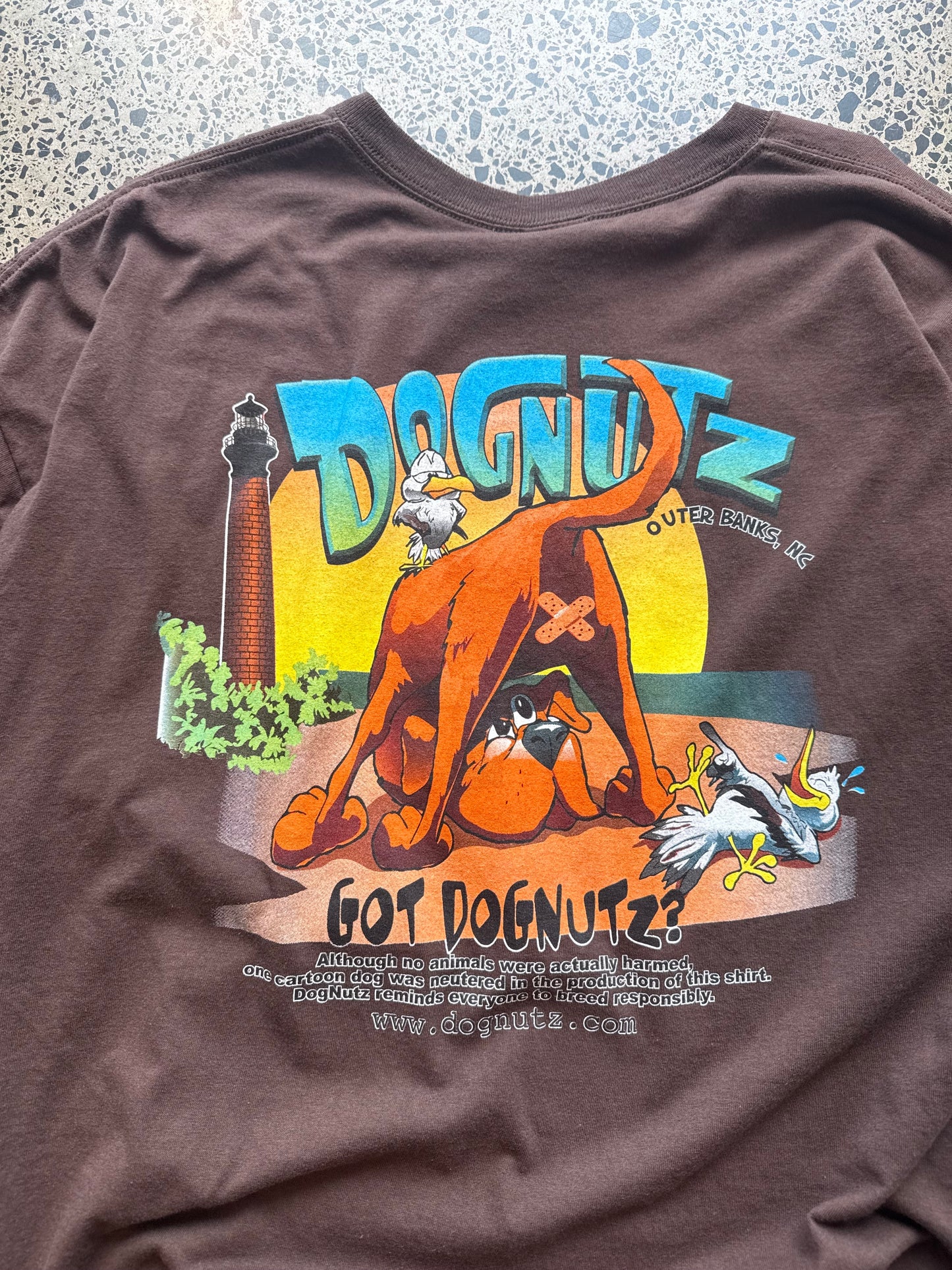 Cop this Dognutz, Outer Banks CA graphic tee on a brown base - 3XL